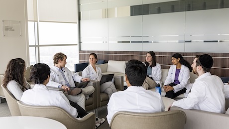 Small group of students discussing
